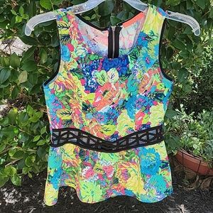 Peplum floral cut put top with zipper